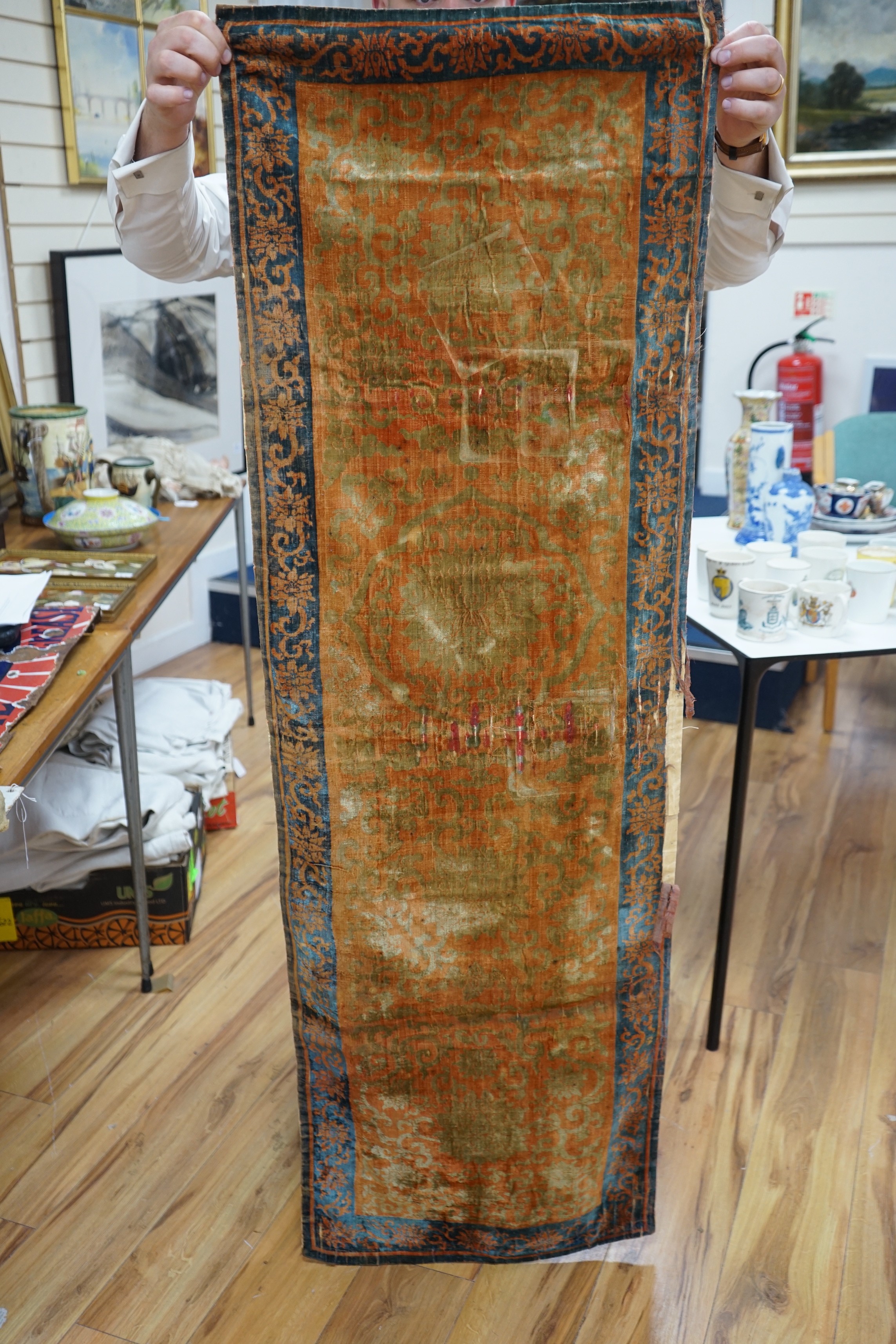 A Chinese cut velvet panel and 3 runners